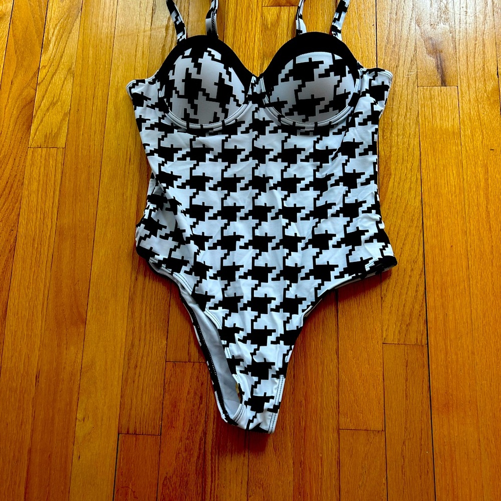 Stylish Black and White womens one piece bathing suit.